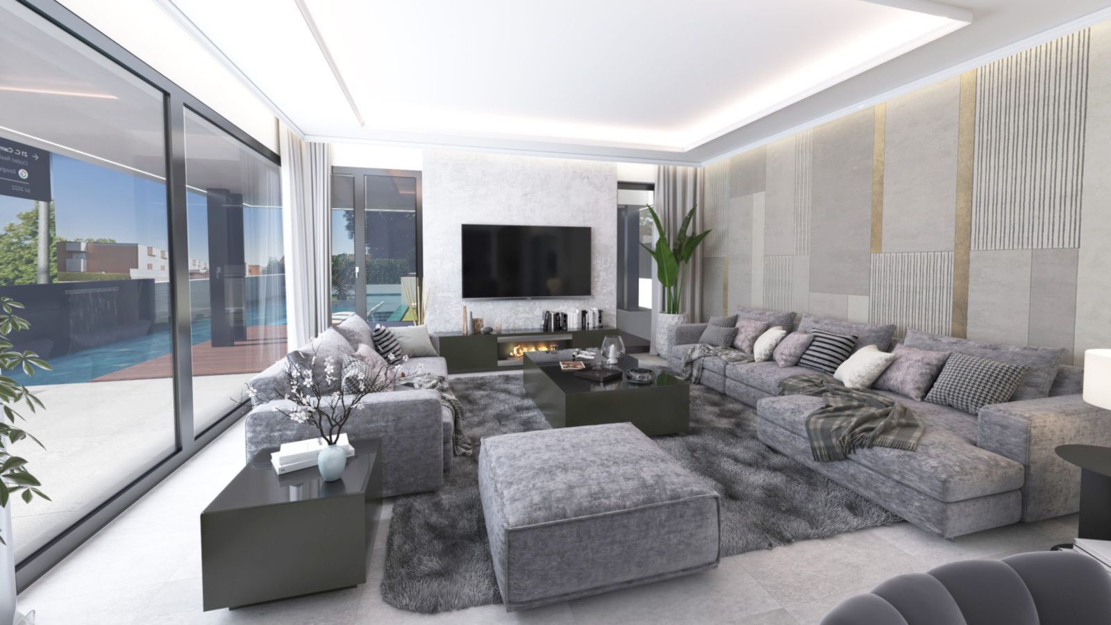 Spacious modern living room with a large grey sectional sofa, fireplace, and pool view.